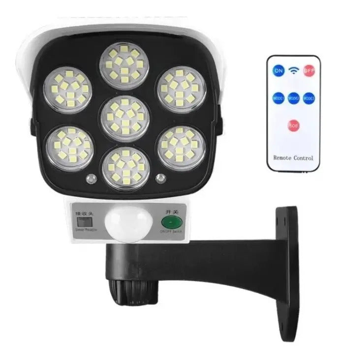Foco solar tipo cámara + sensor de movimiento + control remoto