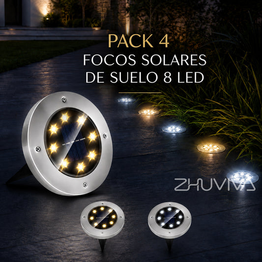 Pack 4 focos solares de suelo 8 LED iluminando sendero de jardín